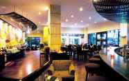 Restoran 6 Grand Tropic Suites Hotel