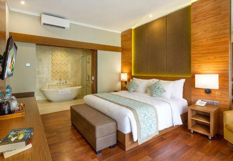 寝室 Adhi Jaya Hotel