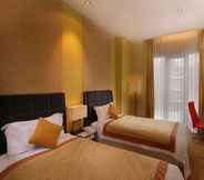 Kamar Tidur 7 Golden Flower by KAGUM Hotels