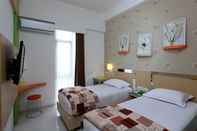 Bedroom Dewarna Hotel Sutoyo