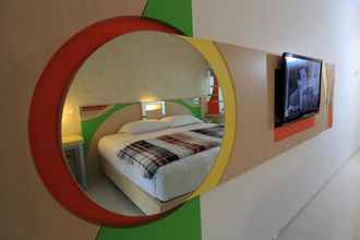 Kamar Tidur 4 Dewarna Hotel Sutoyo