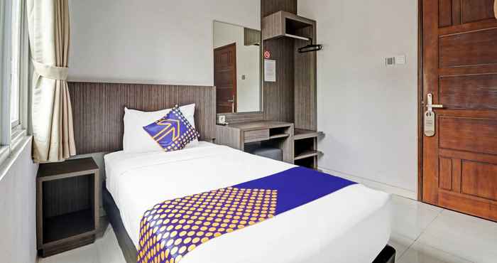 Kamar Tidur SPOT ON 90777 D’river Guest House