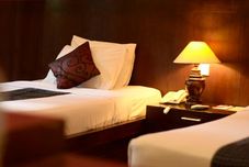 卧室 Puri Sading Hotel