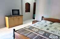 Kamar Tidur Green Roof Homestay