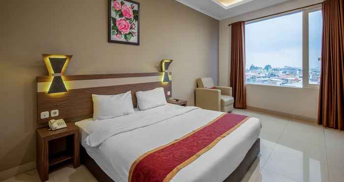 Kamar Tidur Raffleshom Hotel