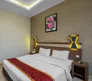 Kamar Tidur 2 Raffleshom Hotel