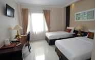 Kamar Tidur 3 Srigunting Inn  - Halal Hotel