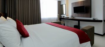 Bedroom 3 The Sun Hotel Madiun