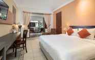 Bedroom 7 Lotus Garden Hotel by Waringin Hospitality