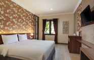 Bedroom 6 Lotus Garden Hotel by Waringin Hospitality