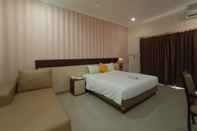 Bedroom OYO 90473 Gowin Hotel