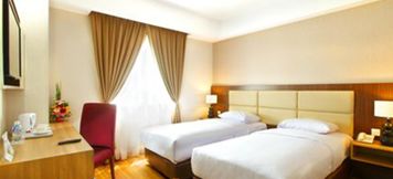 Kamar Tidur 3 Hotel Orchardz Bandara