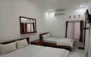 ห้องนอน 4 Nusawiru Guest House