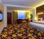 Kamar Tidur 6 Rocky Plaza Hotel Padang