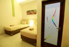 침실 7 Savita Garden Inn