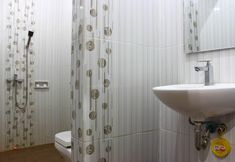In-room Bathroom 6 Gumilang Hotel