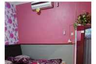 Bedroom Darmo Homestay Room