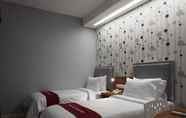 ห้องนอน 2 Hotel Bed and Breakfast Surabaya