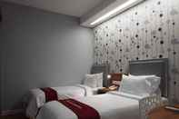 ห้องนอน Hotel Bed and Breakfast Surabaya