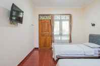 Phòng ngủ Mahendra Beach Inn