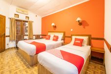 卧室 OYO 1945 Hotel Bali Near RS Muhammadiyah