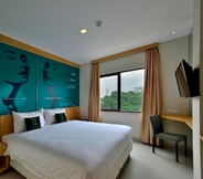 Bedroom 5 Zodiak MT Haryono by KAGUM Hotels