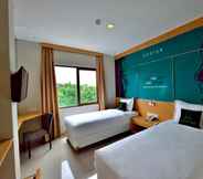 Bedroom 6 Zodiak MT Haryono by KAGUM Hotels