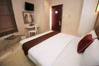 ห้องนอน Hotel Pyrenees Jogja