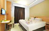 ห้องนอน 3 Nozz Hotel (Dekat Bandara Ahmad Yani Semarang)