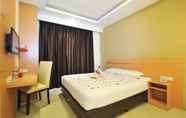 ห้องนอน 7 Nozz Hotel (Dekat Bandara Ahmad Yani Semarang)