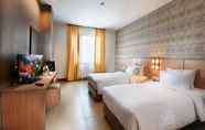 Kamar Tidur 5 Grand Impression Hotel