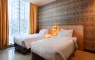 Kamar Tidur 4 Grand Impression Hotel