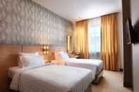 Kamar Tidur Grand Impression Hotel