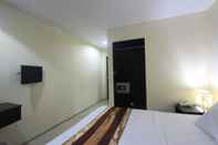 ห้องนอน The Airport Kuta Hotel & Residence