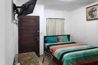 Bedroom OYO 90274 Odah Guest House
