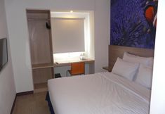 Bedroom 2 Top Hotel Manado by Gran Puri