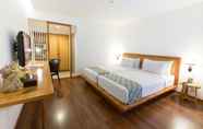 Bedroom 2 Gumilang Regency Hotel by Gumilang Hospitality