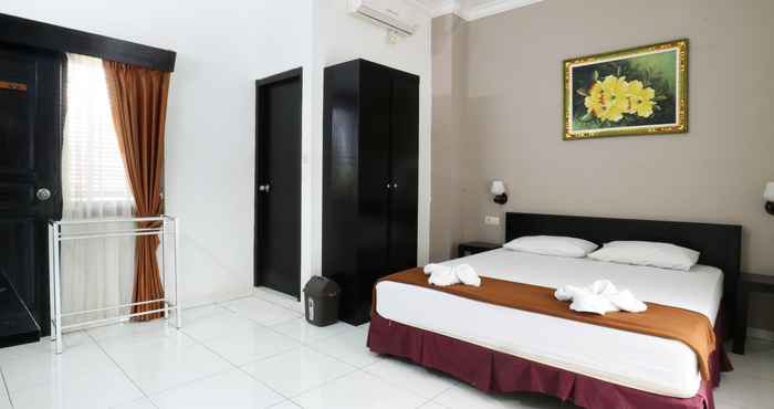 ห้องนอน Warapsari Inn
