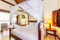 Phòng ngủ Puri Bunga Resort