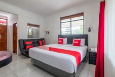 Phòng ngủ Capital O 2066 Narima Hotel