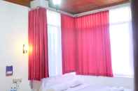 Kamar Tidur Ambun Suri Hotel