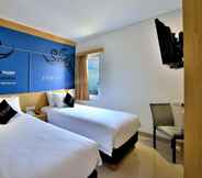 Bedroom 2 Zodiak Kebonjati by KAGUM Hotels