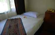 Kamar Tidur 7 Stana Puri Gopa Hotel