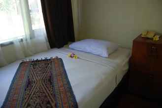 Kamar Tidur 4 Stana Puri Gopa Hotel
