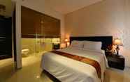 Bedroom 5 Emilia Hotel By Amazing - Palembang