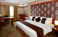 Kamar Tidur 4 Abadi Suite Tower Jambi By Tritama Hospitality