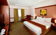 Kamar Tidur 2 Abadi Suite Tower Jambi By Tritama Hospitality