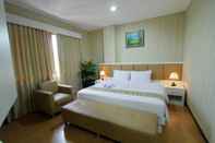 ห้องนอน Front One HK Resort Semarang