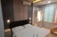 Kamar Tidur Sentra Hotel