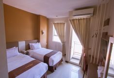 Bedroom 4 Luxpoint Hotel Baratajaya